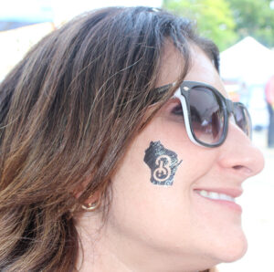 Board president shows tattoo
