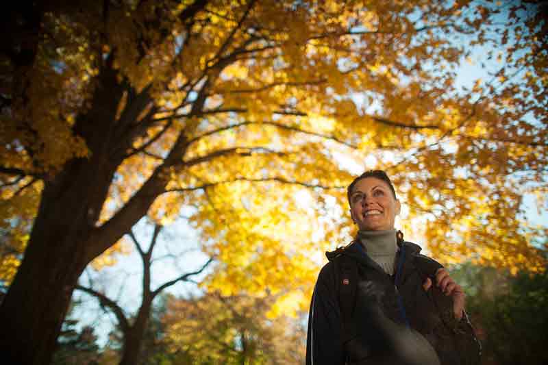 Woman Hiking In Fall At Devil's Lake State Park