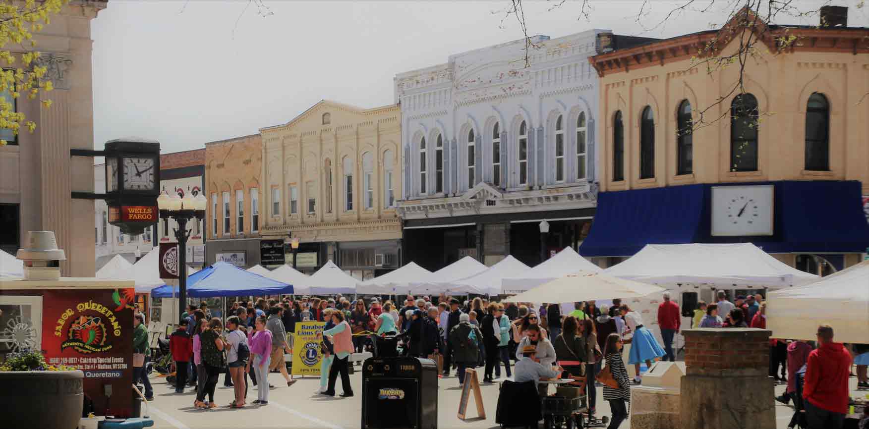 Shoppers At Fair On The Square